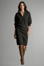 Women's long sleeve ribbed knit jumper dress in black with a button placket.