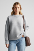 Women's knitted jumper in grey with a round neckline and dropped shoulders