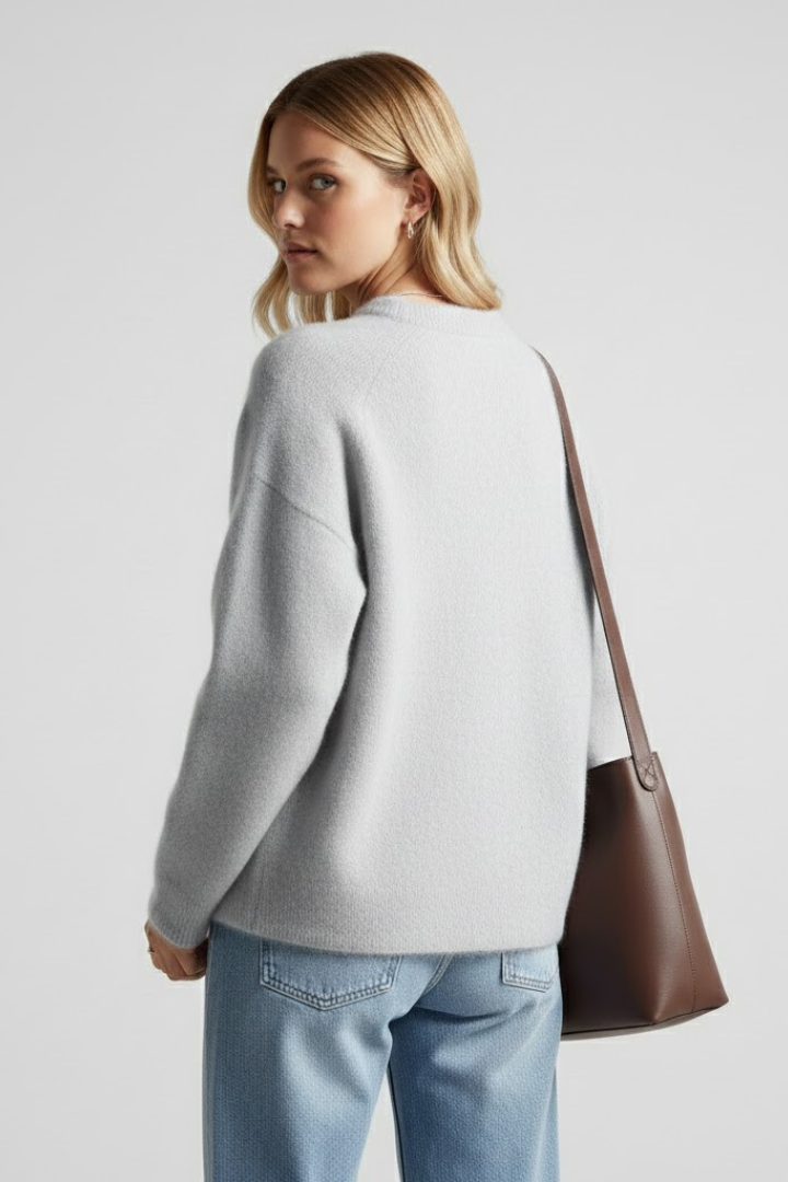 Women's knitted jumper in grey with a round neckline and dropped shoulders