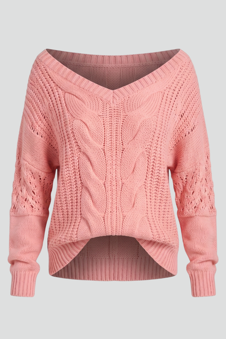 Women's oversized knitted jumper in pink with a round neck and ribbed cuffs
