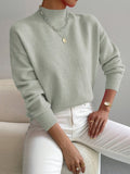 Women's light green relaxed fit mock turtleneck jumper