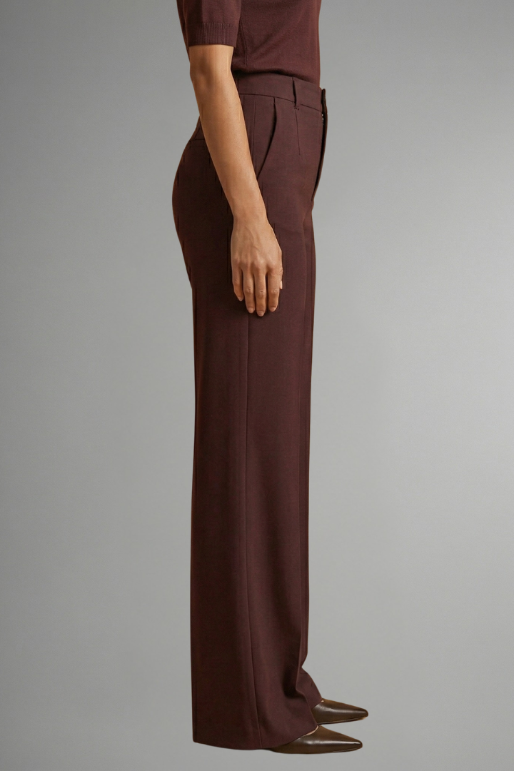 Wine red high-waisted pull-on straight-leg trousers, side view on model