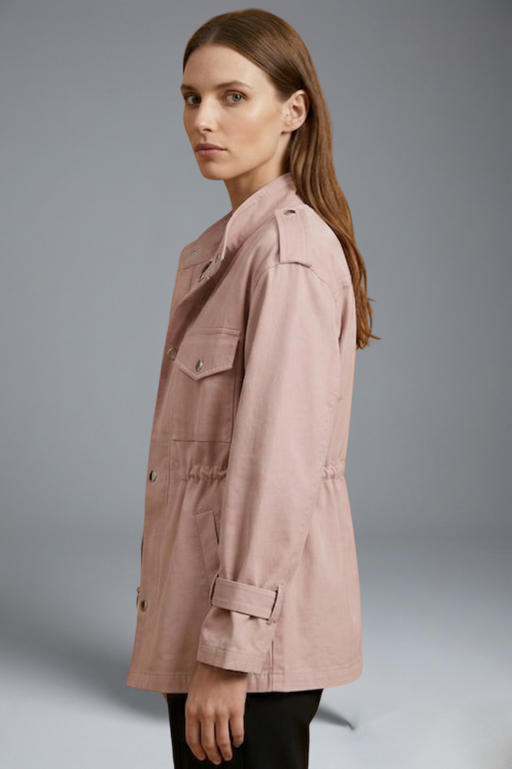 Women's belted utility jacket in pink, side profile showing the belted waist