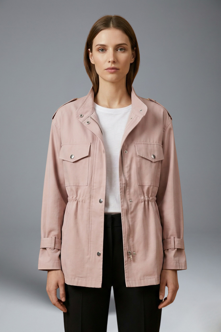 Women's belted utility jacket in pink with double-breasted closure and patch pockets