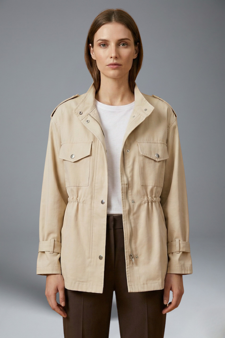 Women's belted utility jacket in cream with double-breasted closure and patch pockets
