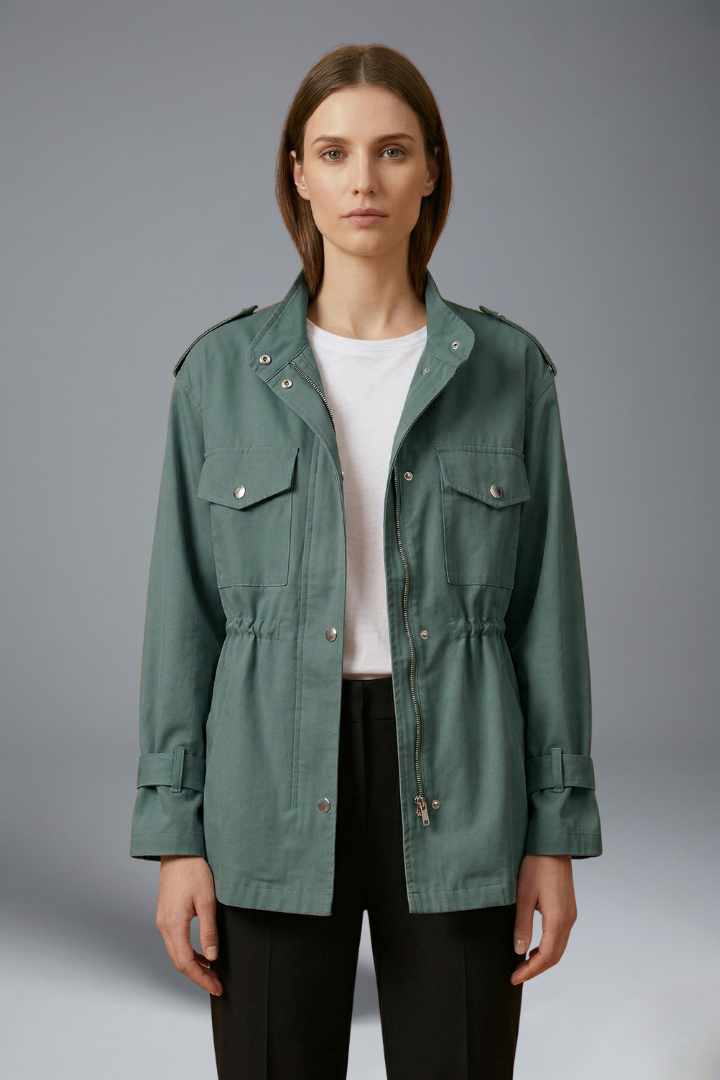 Women's belted utility jacket in green with double-breasted closure and patch pockets