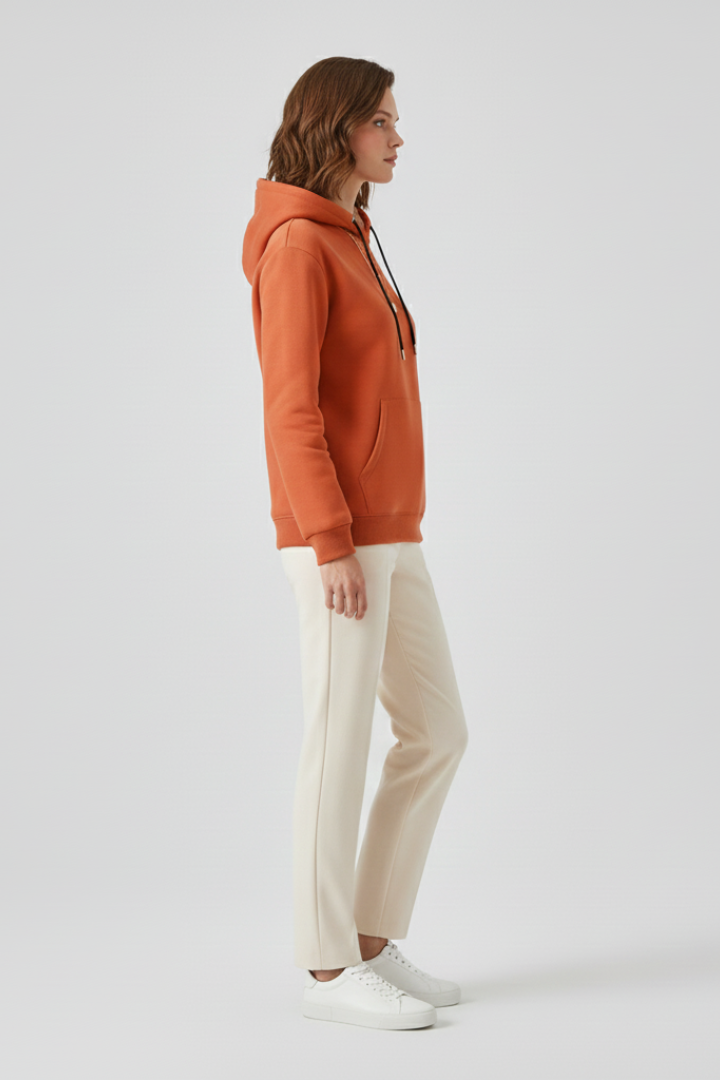 Women's fleece-lined pullover hoodie in burnt orange with ribbed cuffs